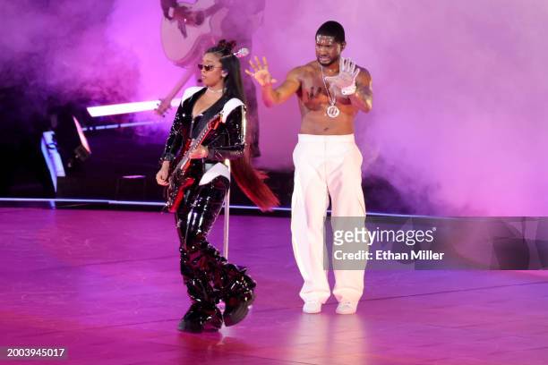 And Usher perform onstage during the Apple Music Super Bowl LVIII Halftime Show at Allegiant Stadium on February 11, 2024 in Las Vegas, Nevada.