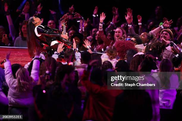 Performs onstage during the Apple Music Super Bowl LVIII Halftime Show at Allegiant Stadium on February 11, 2024 in Las Vegas, Nevada.