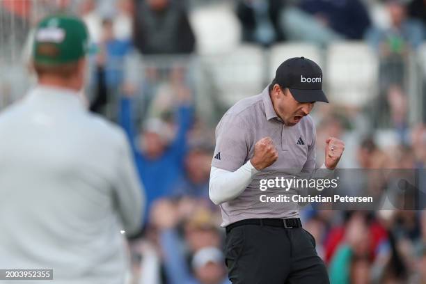 Nick Taylor of Canada celebrates making his putt to win on the second-playoff hole against Charley Hoffman of the United States during the final...