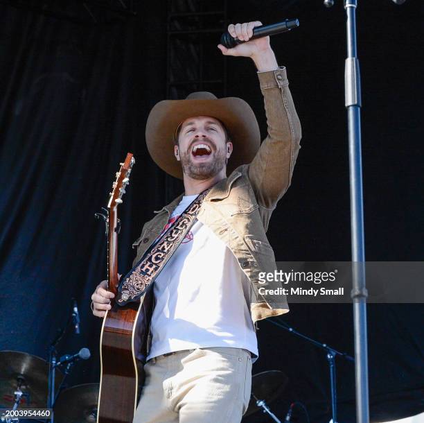 Dustin Lynch performs at Guy Fieri's Flavortown Tailgate on February 11, 2024 in Las Vegas, Nevada.