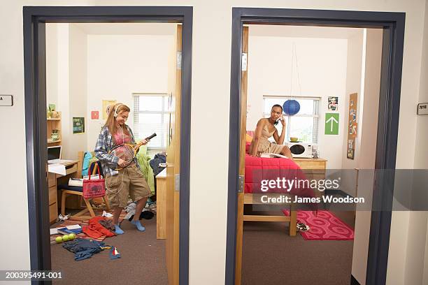 young women in neat and messy dorm rooms - bad neighbor foto e immagini stock