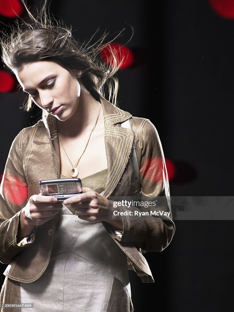 Young woman using mobile phone