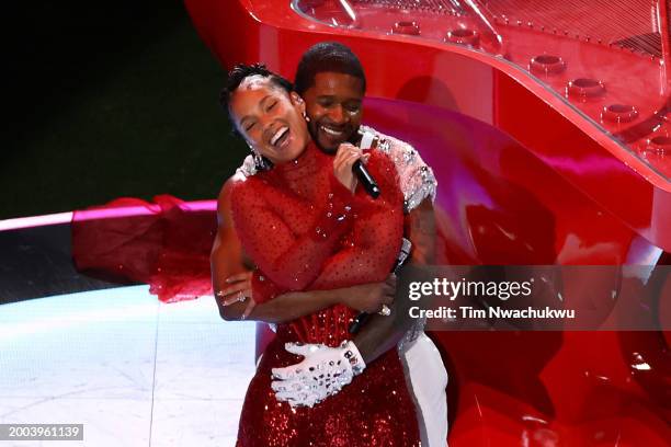 Usher and Alicia Keys perform onstage during the Apple Music Super Bowl LVIII Halftime Show at Allegiant Stadium on February 11, 2024 in Las Vegas,...