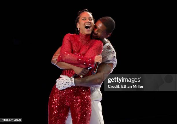 Alicia Keys and Usher perform onstage during the Apple Music Super Bowl LVIII Halftime Show at Allegiant Stadium on February 11, 2024 in Las Vegas,...