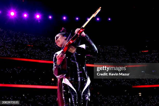 Performs onstage during the Apple Music Super Bowl LVIII Halftime Show at Allegiant Stadium on February 11, 2024 in Las Vegas, Nevada.