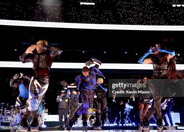 Usher performs onstage during the Apple Music Super Bowl LVIII Halftime Show at Allegiant Stadium on February 11, 2024 in Las Vegas, Nevada.