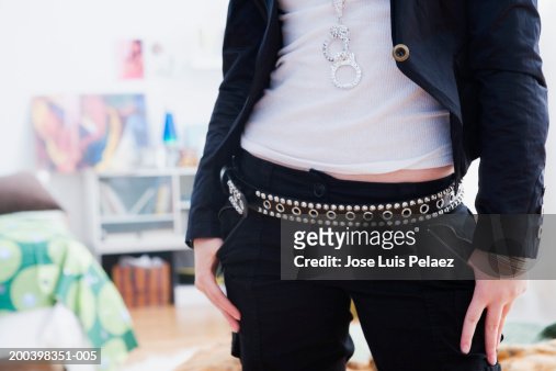 Teenage Girl Wearing Belt With Studs Mid Section High-Res Stock Photo ...