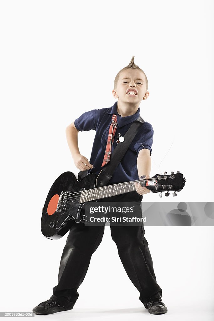 Boy With Mohawk Hairstyle And Guitar High-Res Stock Photo - Getty Images