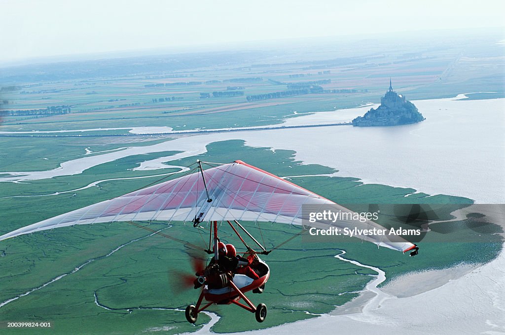 France, Normandy, ultralight over Mont Saint-Michel, aerial view
