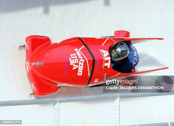 Pilot Shauna Rohbock and brakewoman Valerie Fleming slide, 21 January 2005 at Cesana Pariol , during the first run of the 5th 2Women Bobsleigh World...