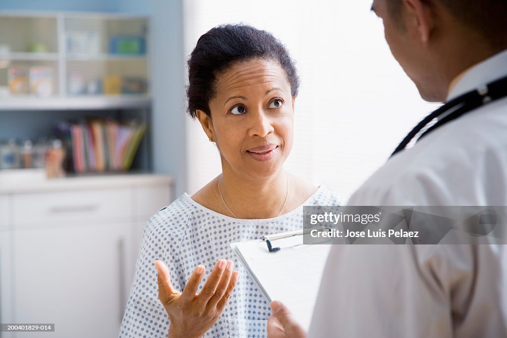 Female patient talking with doctor