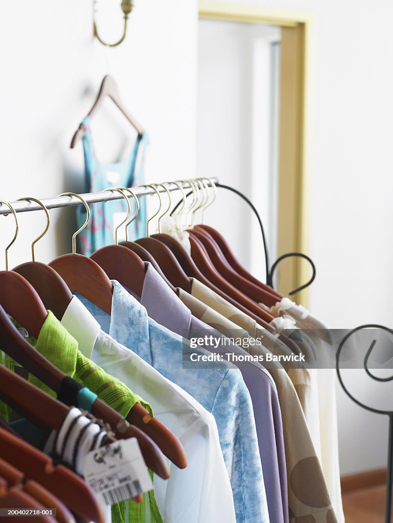 Shirts on clothes rack in retail store