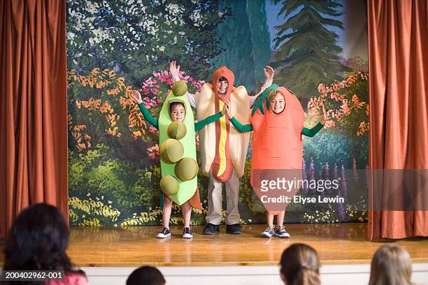 children (9-5) in school play - performance stock pictures, royalty-free photos & images