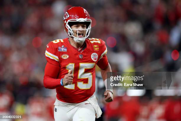 Patrick Mahomes of the Kansas City Chiefs reacts after throwing a pass for a touchdown in the third quarter against the San Francisco 49ers during...