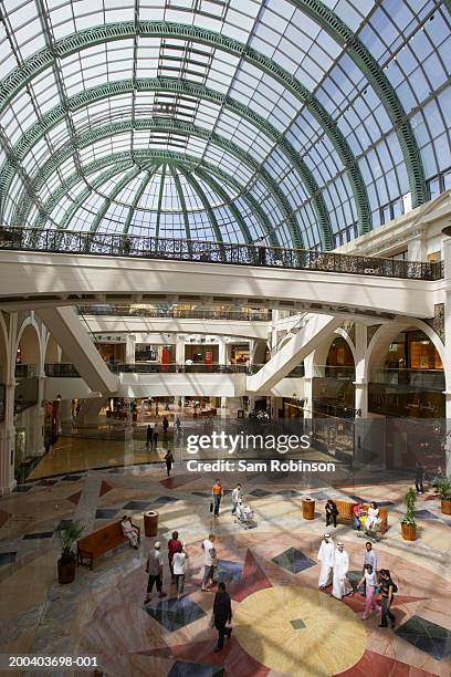 united arab emirates, dubai, people in emirates shopping mall - wt1 stock pictures, royalty-free photos & images