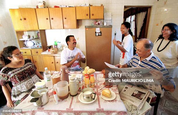 Eduardo Suplicy Brazilian senator of opposition and one of the candidates of the 2002 presidential election by the Worker's Party , reads a periodic...