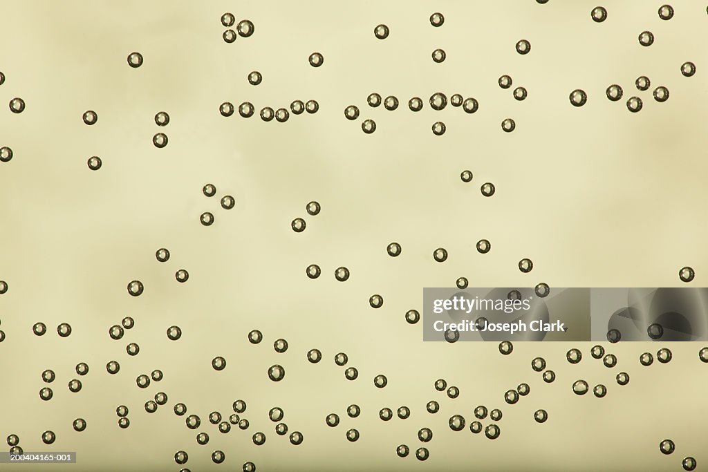 Bubbles in yellow liquid