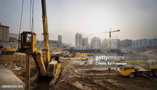 construction site (digital enhancement) - construction crane asia stock pictures, royalty-free photos & images