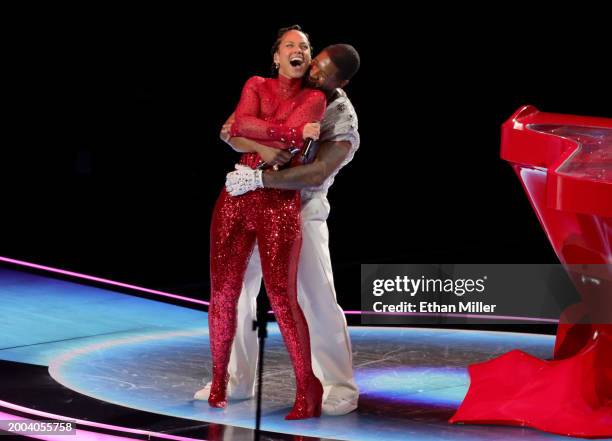 Alicia Keys and Usher perform onstage during the Apple Music Super Bowl LVIII Halftime Show at Allegiant Stadium on February 11, 2024 in Las Vegas,...