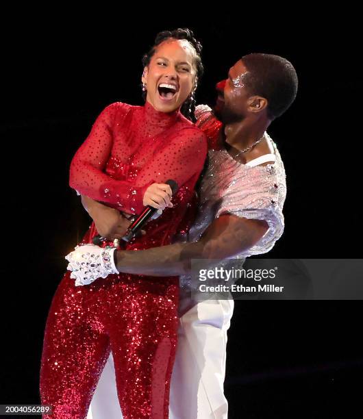 Alicia Keys and Usher perform onstage during the Apple Music Super Bowl LVIII Halftime Show at Allegiant Stadium on February 11, 2024 in Las Vegas,...