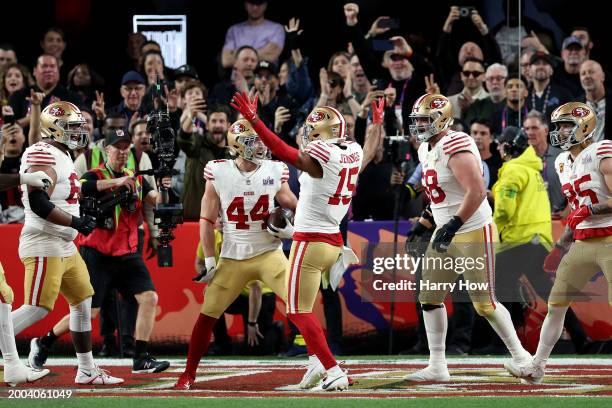 Jauan Jennings of the San Francisco 49ers celebrates a touchdown with Kyle Juszczyk during the third quarter against the Kansas City Chiefs during...