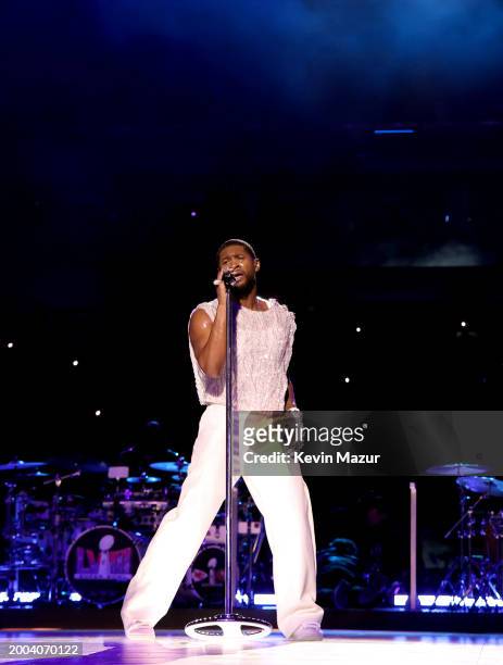 Usher performs onstage during the Apple Music Super Bowl LVIII Halftime Show at Allegiant Stadium on February 11, 2024 in Las Vegas, Nevada.