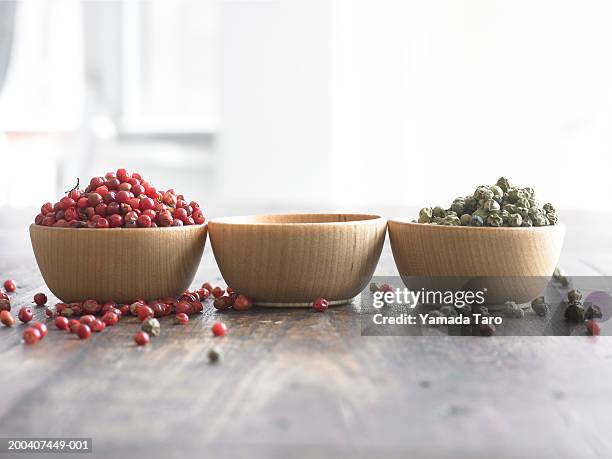 spices in bowls - overflow stock pictures, royalty-free photos & images