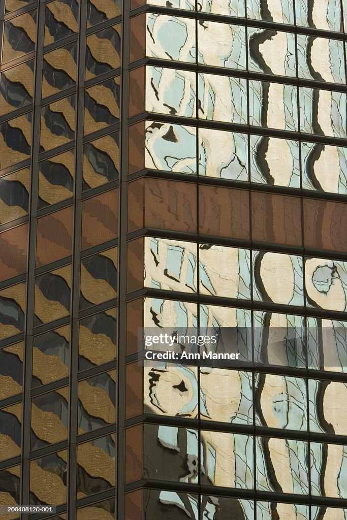 Building reflecting in windows of another building