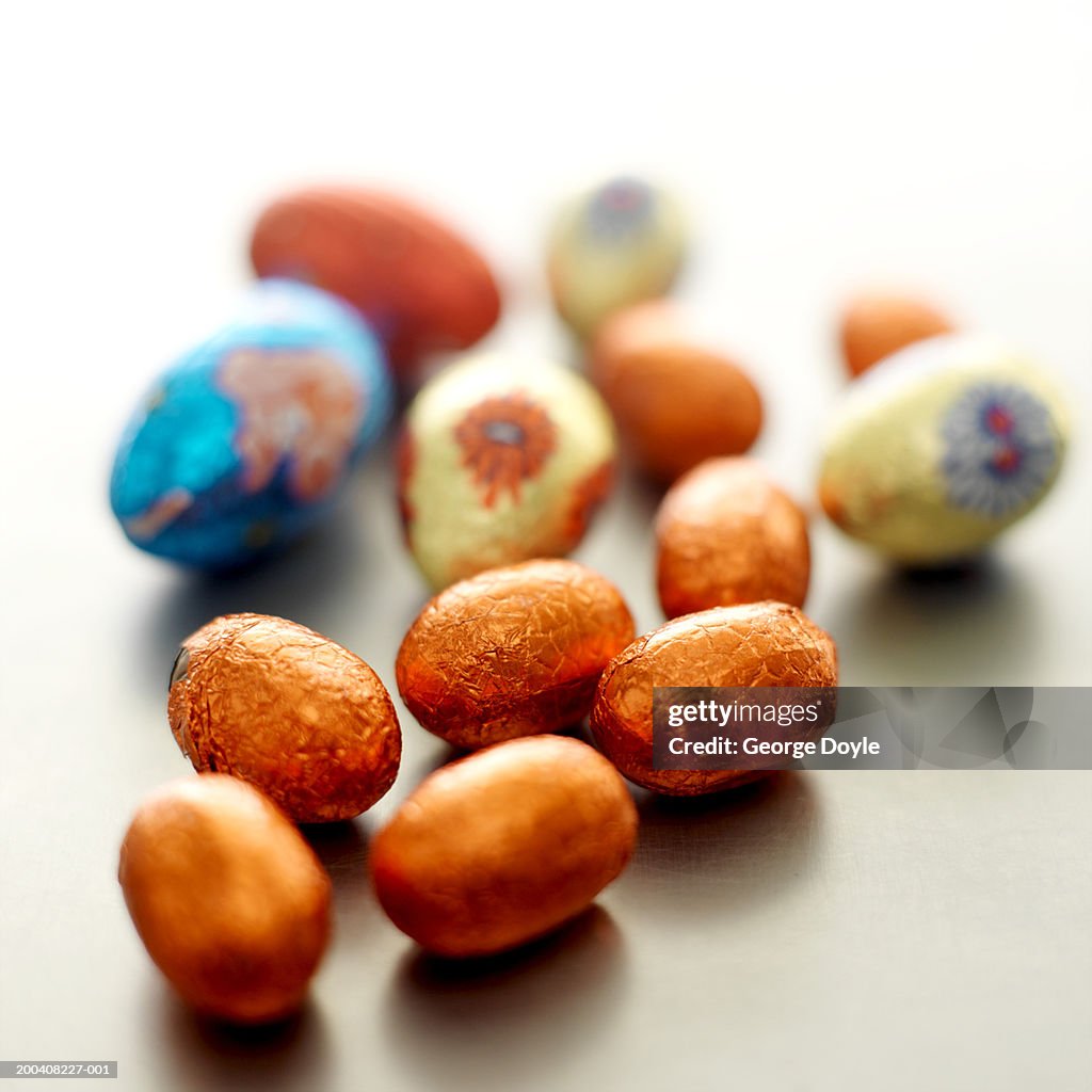 Chocolate eggs wrapped in foil, close-up