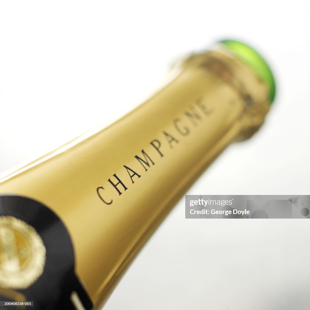 Neck of champagne bottle, close-up