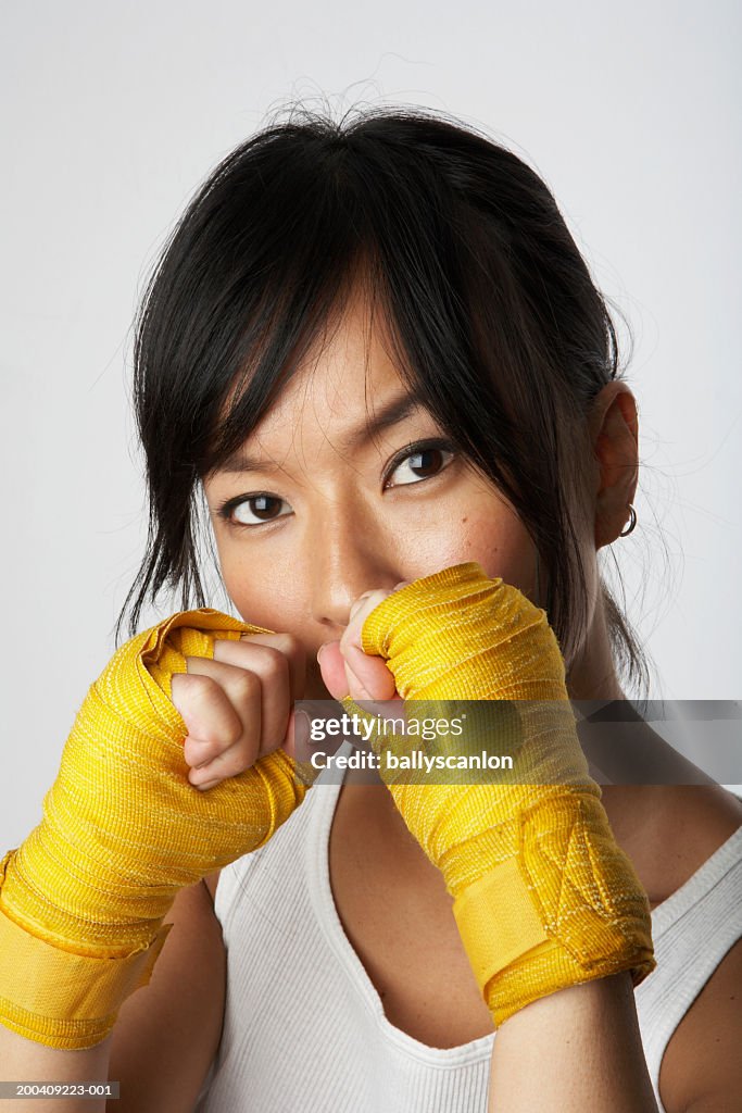 Woman wearing boxing wraps