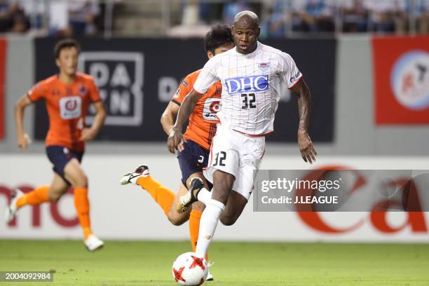 Victor Ibarbo of Sagan Tosu controls the ball against Keisuke Oyama of Omiya Ardija during the J.League J1 match between Sagan Tosu and Omiya Ardija...