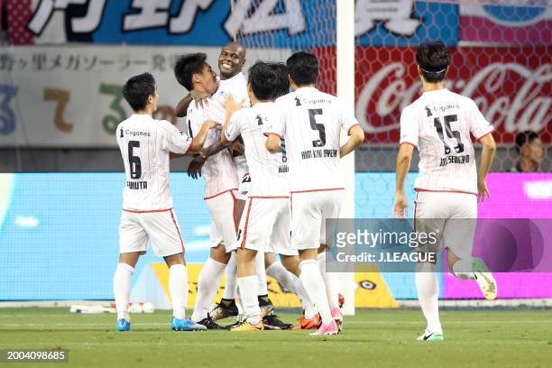 Victor Ibarbo of Sagan Tosu celebrates with teammates after scoring the team's second goal during the J.League J1 match between Sagan Tosu and Omiya...