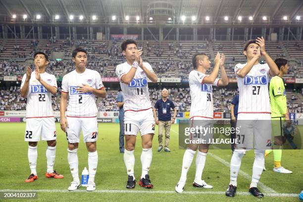 Sagan Tosu players applaud fans after the team's 3-0 victory in the J.League J1 match between Sagan Tosu and Omiya Ardija at Best Amenity Stadium on...