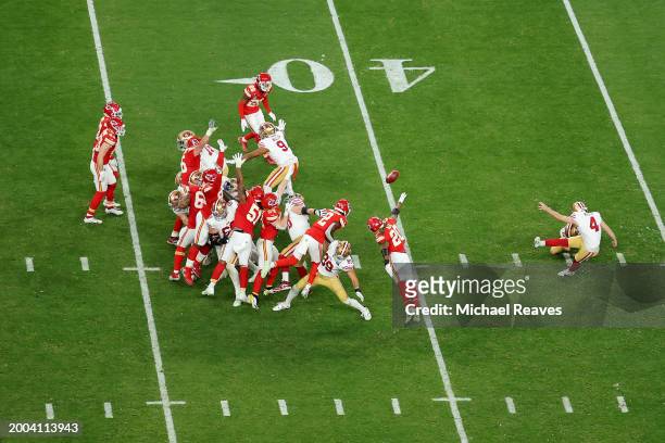 Jake Moody of the San Francisco 49ers kicks a field goal in the fourth quarter against the Kansas City Chiefs during Super Bowl LVIII at Allegiant...