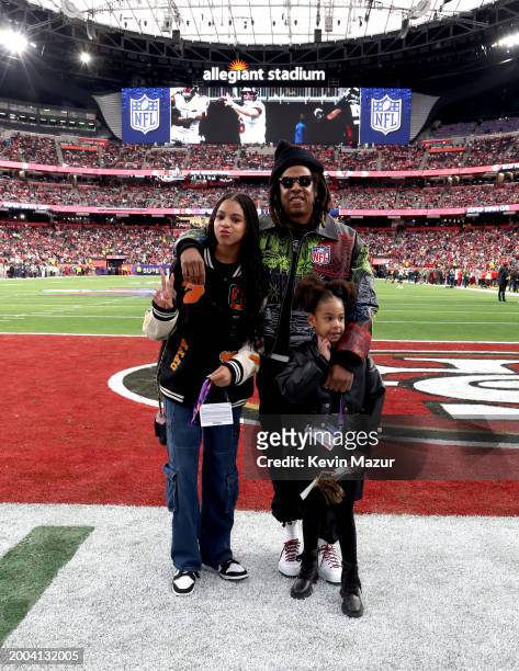 Blue Ivy Carter, Jay-Z and Rumi Carter attend the Super Bowl LVIII Pregame at Allegiant Stadium on February 11, 2024 in Las Vegas, Nevada.