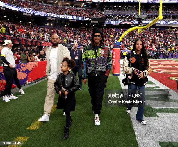 Juan 'OG' Perez, Rumi Carter, Jay-Z and Blue Ivy Carter attend the Super Bowl LVIII Pregame at Allegiant Stadium on February 11, 2024 in Las Vegas,...