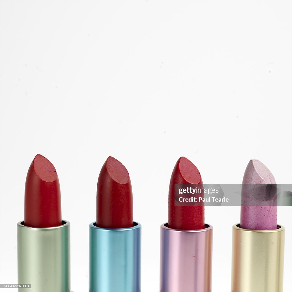 Four lipsticks, close up