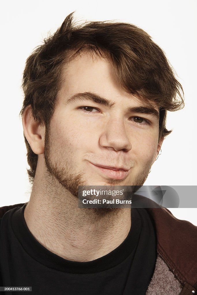 Young man making face, portrait, close-up