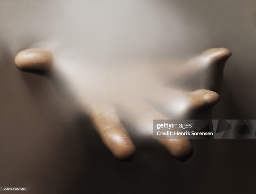 Impression of man's hand in rubber, close-up