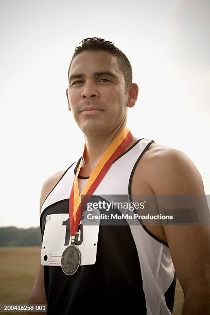 man wearing medal, portrait - marathon medal stock pictures, royalty-free photos & images