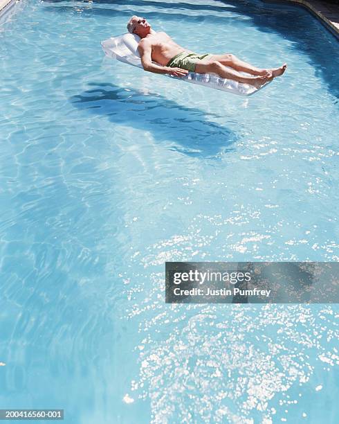 Guy On Inflatable Raft Man Raft Pool Photos and Premium High Res Pictures - Getty Images