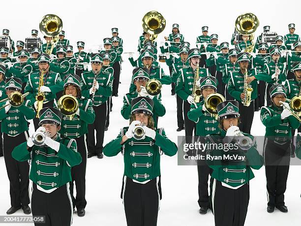 teenage (14-18) marching band standing in rows, elevated view - marching band stock pictures, royalty-free photos & images