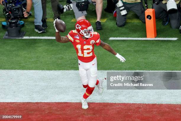 Mecole Hardman Jr. #12 of the Kansas City Chiefs celebrates after catching the game-winning touchdown in overtime to defeat the San Francisco 49ers...