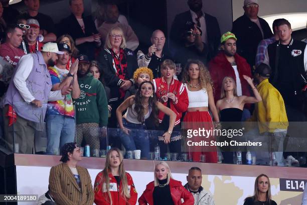 Miles Teller , Keleigh Teller, Ice Spice, Taylor Swift, Blake Lively, Ashley Avignone and Aric Jones react in overtime during Super Bowl LVIII...