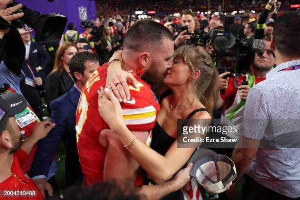 Travis Kelce of the Kansas City Chiefs kisses Taylor Swift after defeating the San Francisco 49ers 2 during Super Bowl LVIII at Allegiant Stadium on...