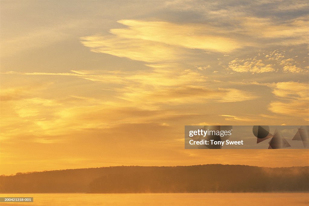 Clouds above water, sunrise