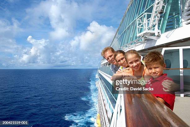 mother and father with children (10-12) on cruise ship - kreuzfahrtschiff stock-fotos und bilder