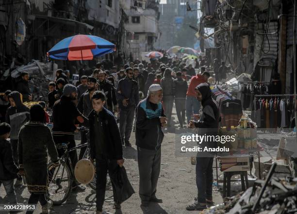 Hawkers are seen selling what little food and basic life necessities they have left on the streets as Palestinians struggle with the rising cost of...