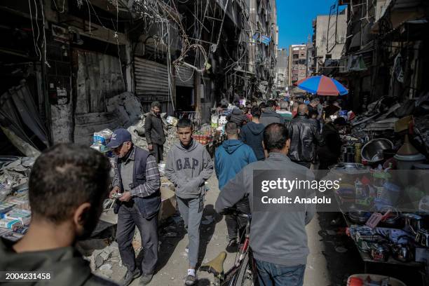 Hawkers are seen selling what little food and basic life necessities they have left on the streets as Palestinians struggle with the rising cost of...